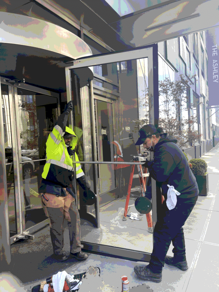 Revolving door installation at a commercial building entrance in NYC